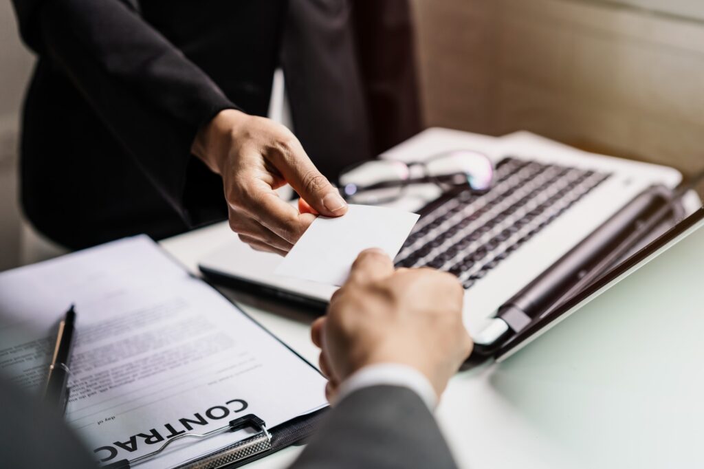 Business executive exchanging business card, Cooperation concept